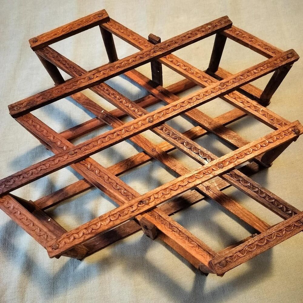 Carved wooden accordion wine rack
